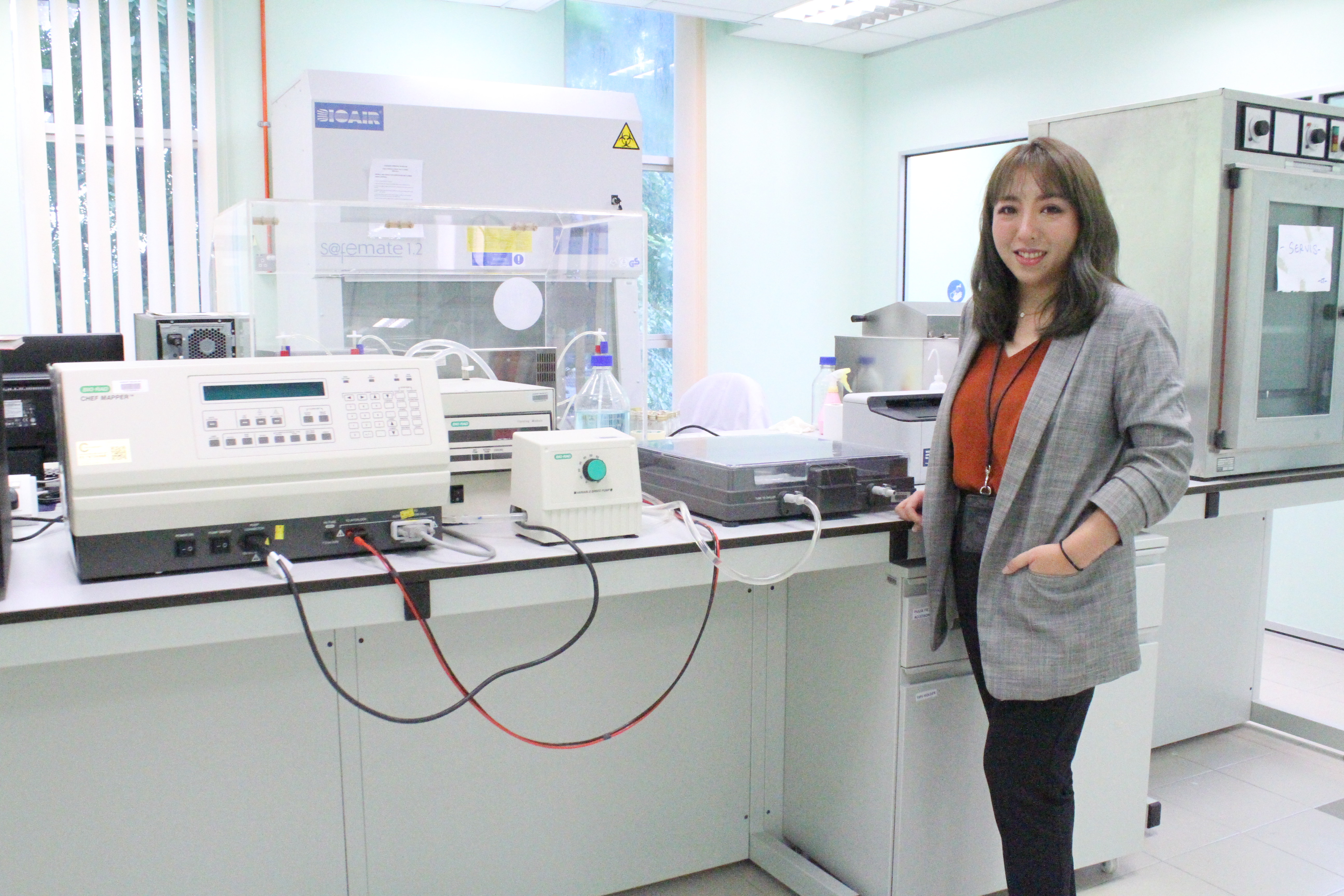 Dr. Chai with some of the equipment she uses for her research.